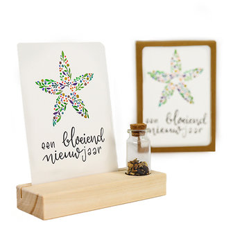 Een bloeiend nieuwjaar - bedankje zaden in glazen flesje met kaart en standaard