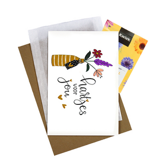 Bloemenzaden met kaart 'Hartjes voor jou' verpakt in pergamijn zakje