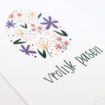 Bloemenzaden met kaart 'Vrolijk pasen // Floralis' verpakt in pergamijn zakje