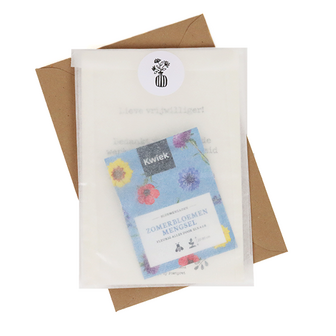 Bloemenzaden met kaart &#039;Groetjes&#039; verpakt in pergamijn zakje