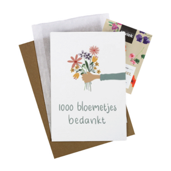 Bloemenzaden met kaart &#039;1000 bloemetjes bedankt&#039; verpakt in pergamijn zakje // Floralis