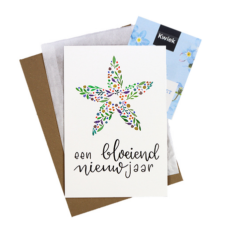 Bloemenzaden met kaart 'Een bloeiend nieuwjaar' verpakt in pergamijn zakje