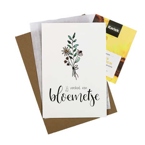Bloemenzaden met kaart 'Jij verdient een bloemetje' verpakt in pergamijn zakje