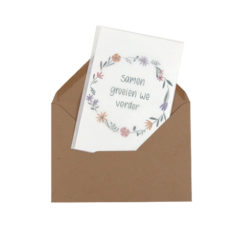Bloemenzaden met kaart 'Samen groeien we verder // Floralis' verpakt in pergamijn zakje