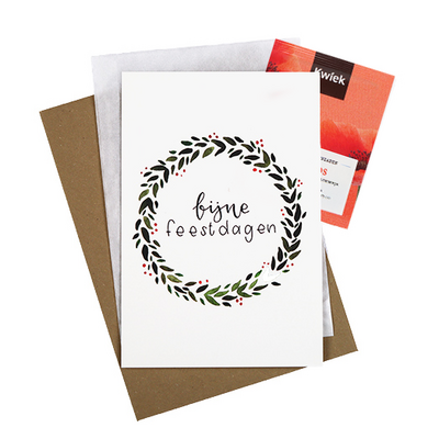 Bloemenzaden met kaart 'Fijne feestdagen' verpakt in pergamijn zakje // Rond