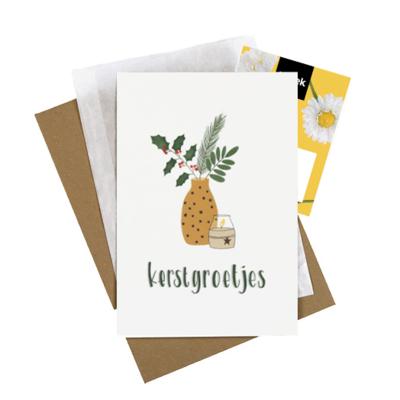 Bloemenzaden met kaart 'Kerstgroetjes' verpakt in pergamijn zakje